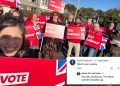 People holding 'vote labour' signs and a screenshot of the offensive comment